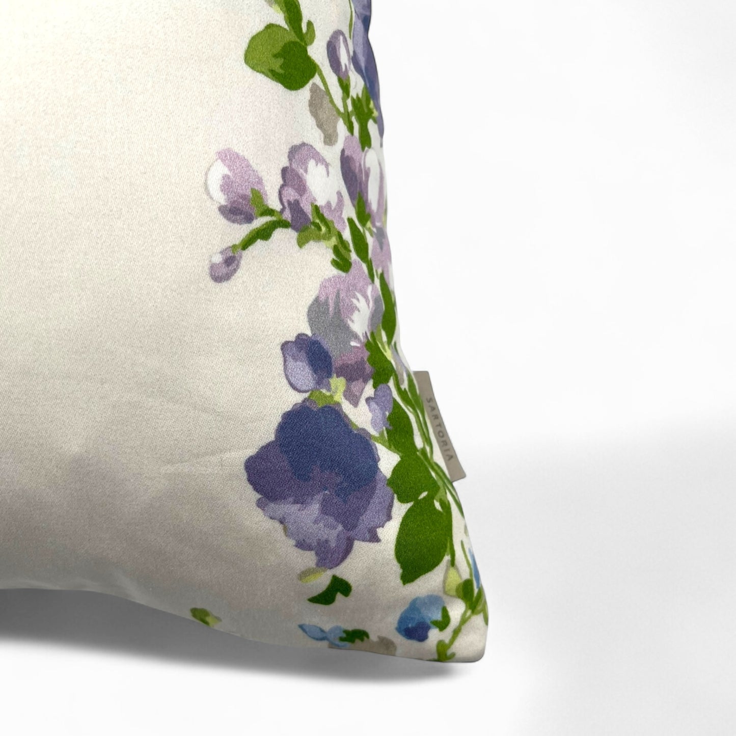 Pillow in Nina Campbell “wisteria bouquet” fabric and back in jacquard pattern