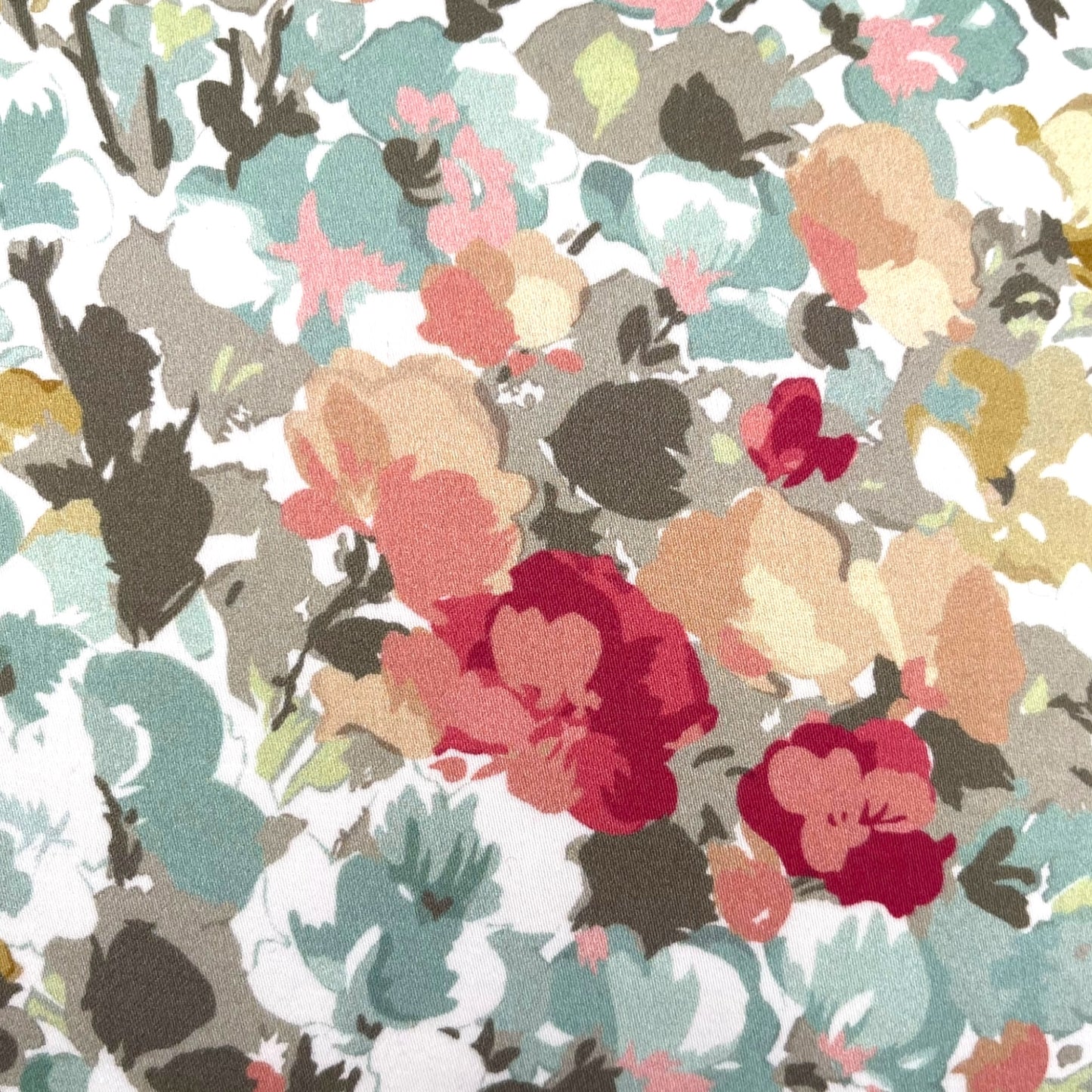 Pillow in Nina Campbell “bouquet in mint” fabric and back in jacquard pattern