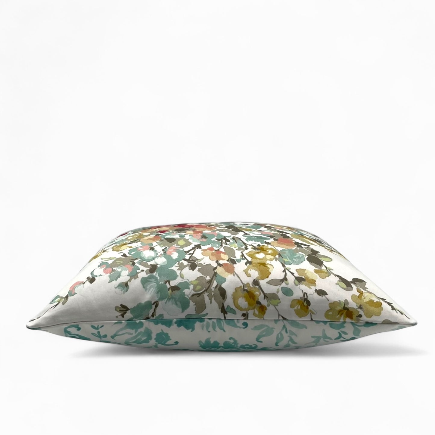 Pillow in Nina Campbell “bouquet in mint” fabric and back in jacquard pattern
