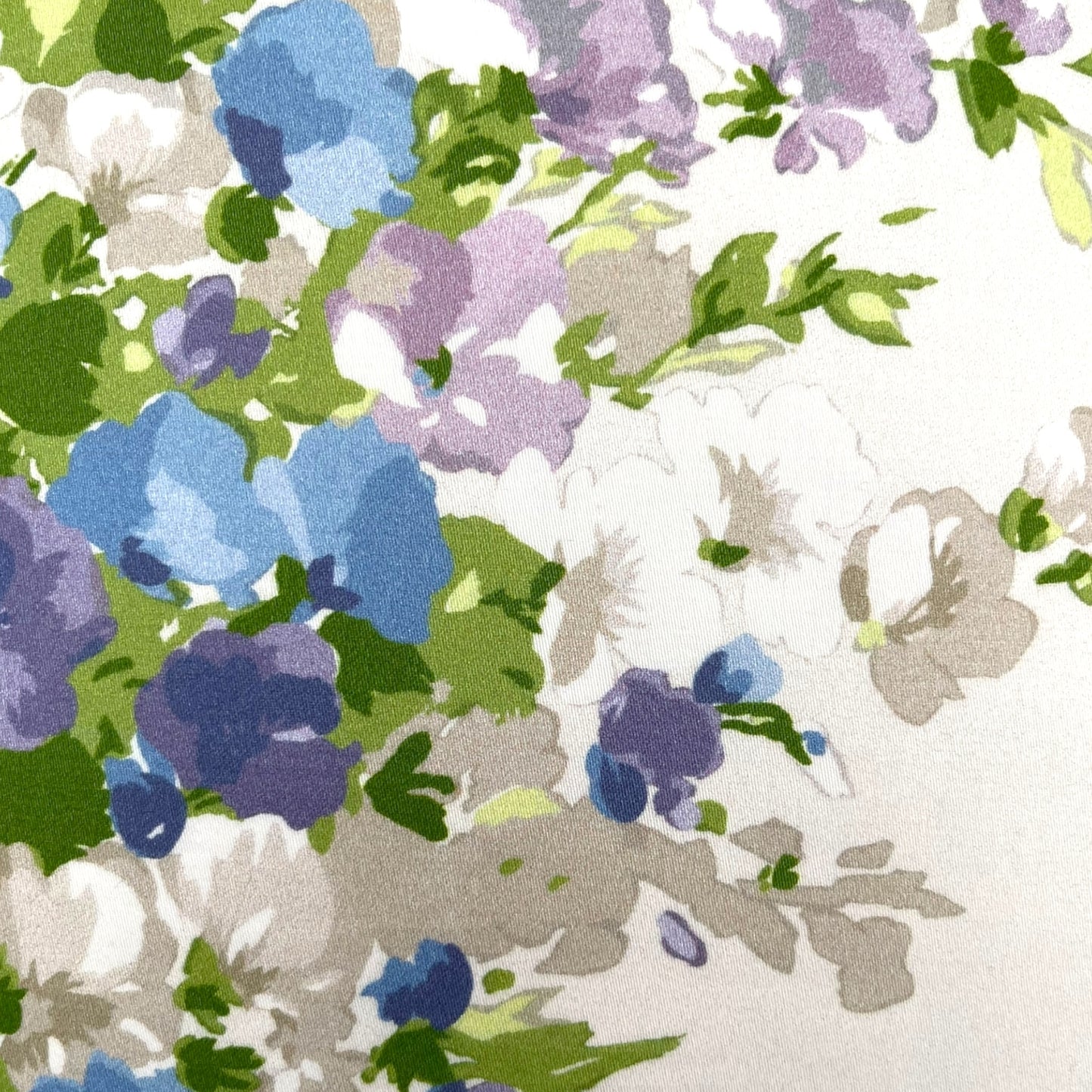 Pillow in Nina Campbell “wisteria bouquet” fabric and back in jacquard pattern