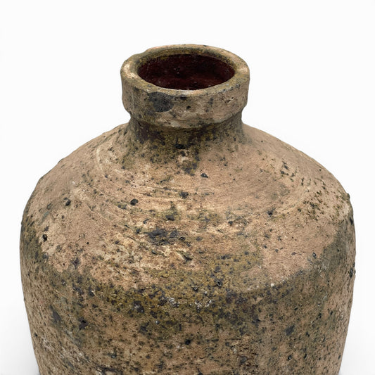 Small handcrafted amphora