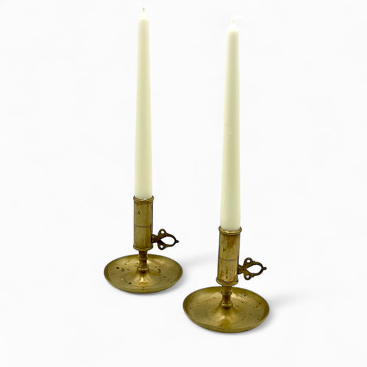 Pair of early 1900’s Swedish brass push-up chambersticks