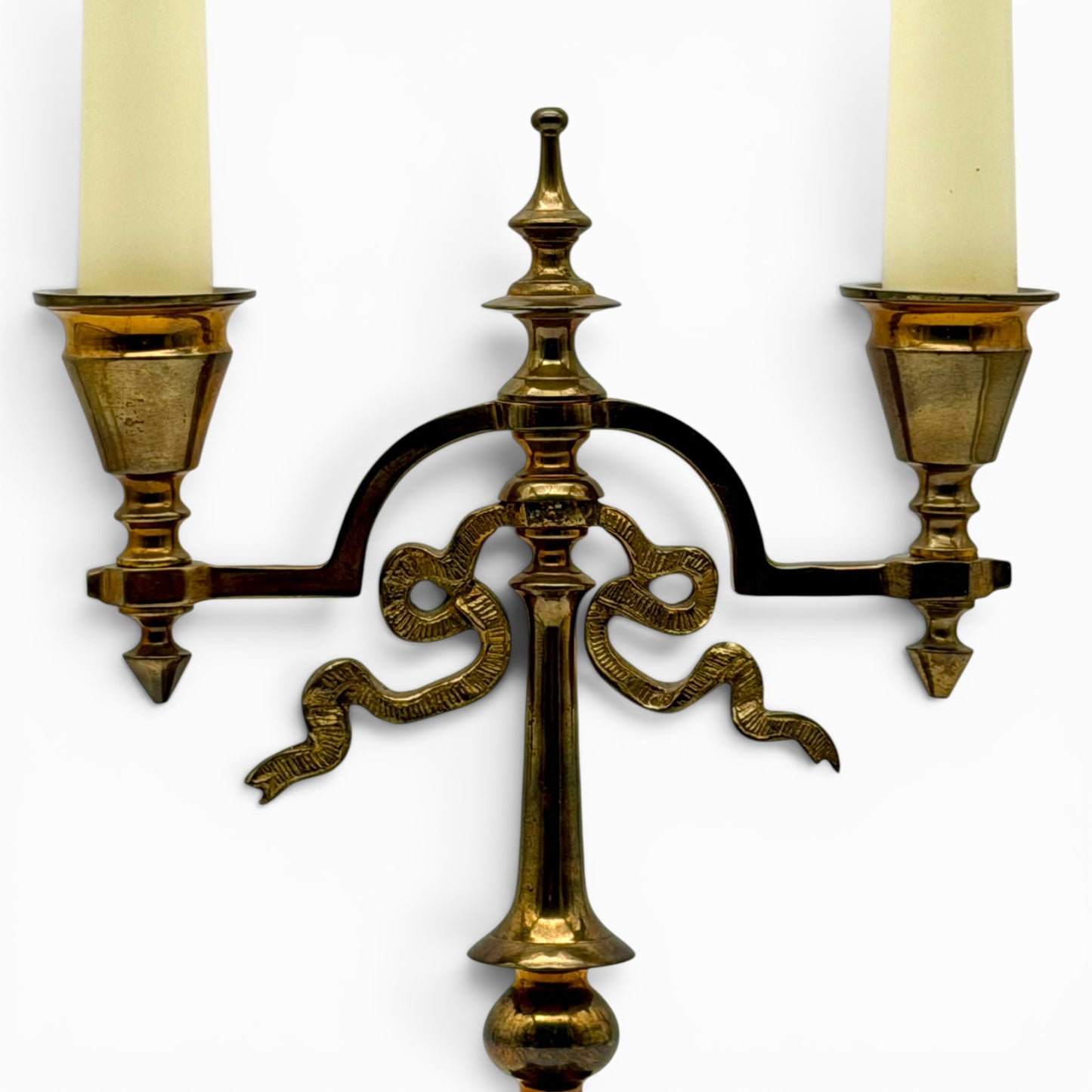 Antique two-arm brass candelabra with serpentine decorations
