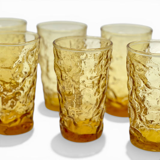 Set of seven vintage honey amber juice glasses