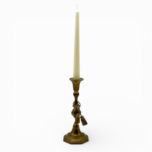 Vintage brass candlestick with rope and tassel