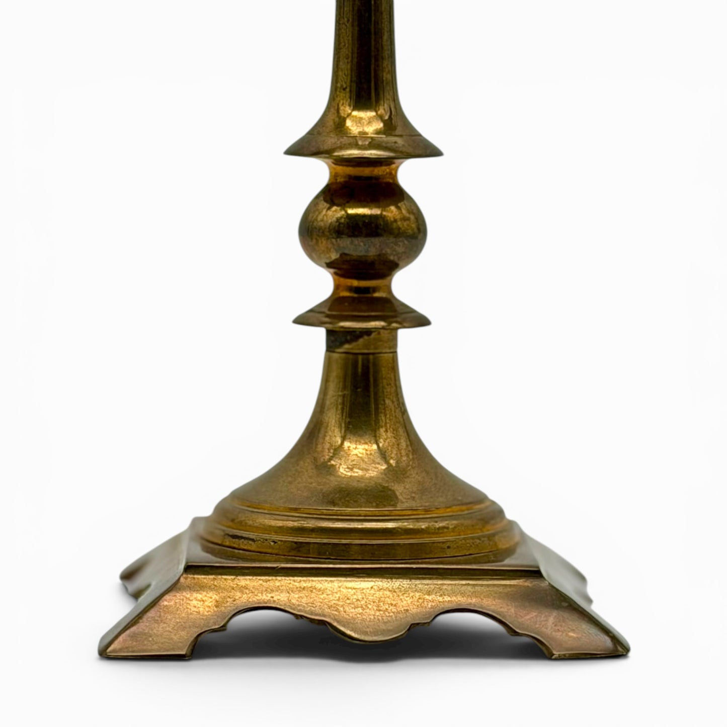 Antique two-arm brass candelabra with serpentine decorations