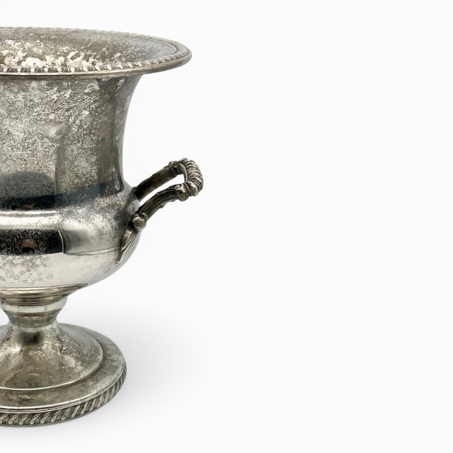 Vintage silver-plated champagne bucket with ornate handles