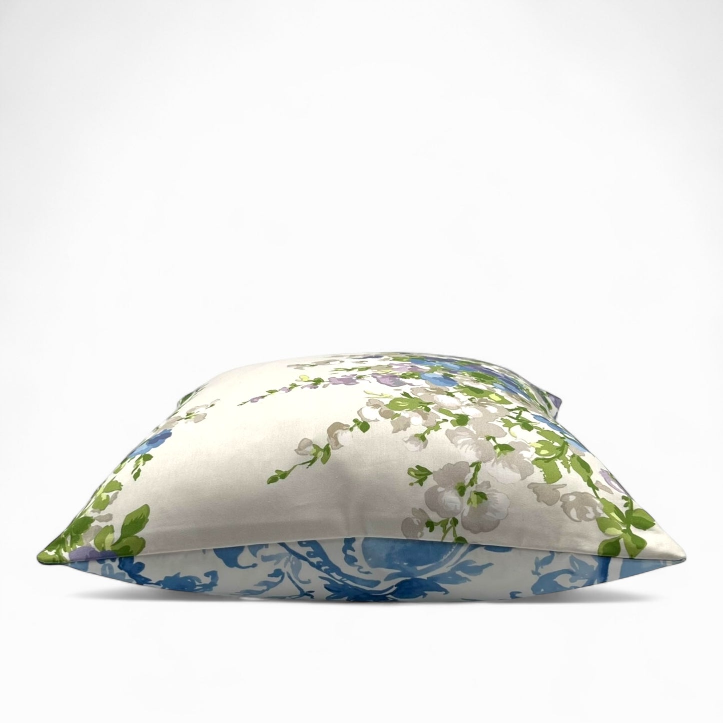 Pillow in Nina Campbell “wisteria bouquet” fabric and back in jacquard pattern