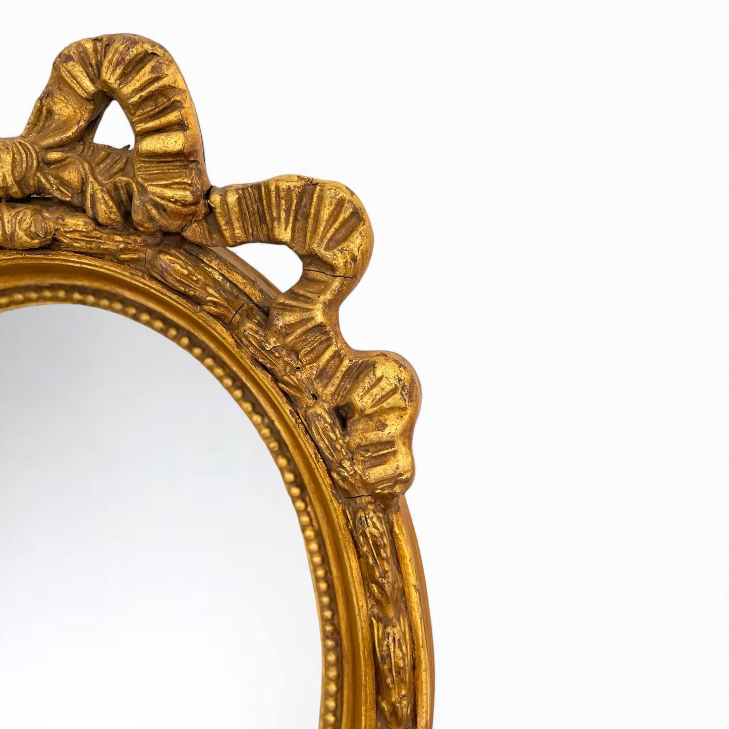 19th CENTURY FRENCH GILTWOOD OVAL MIRROR
