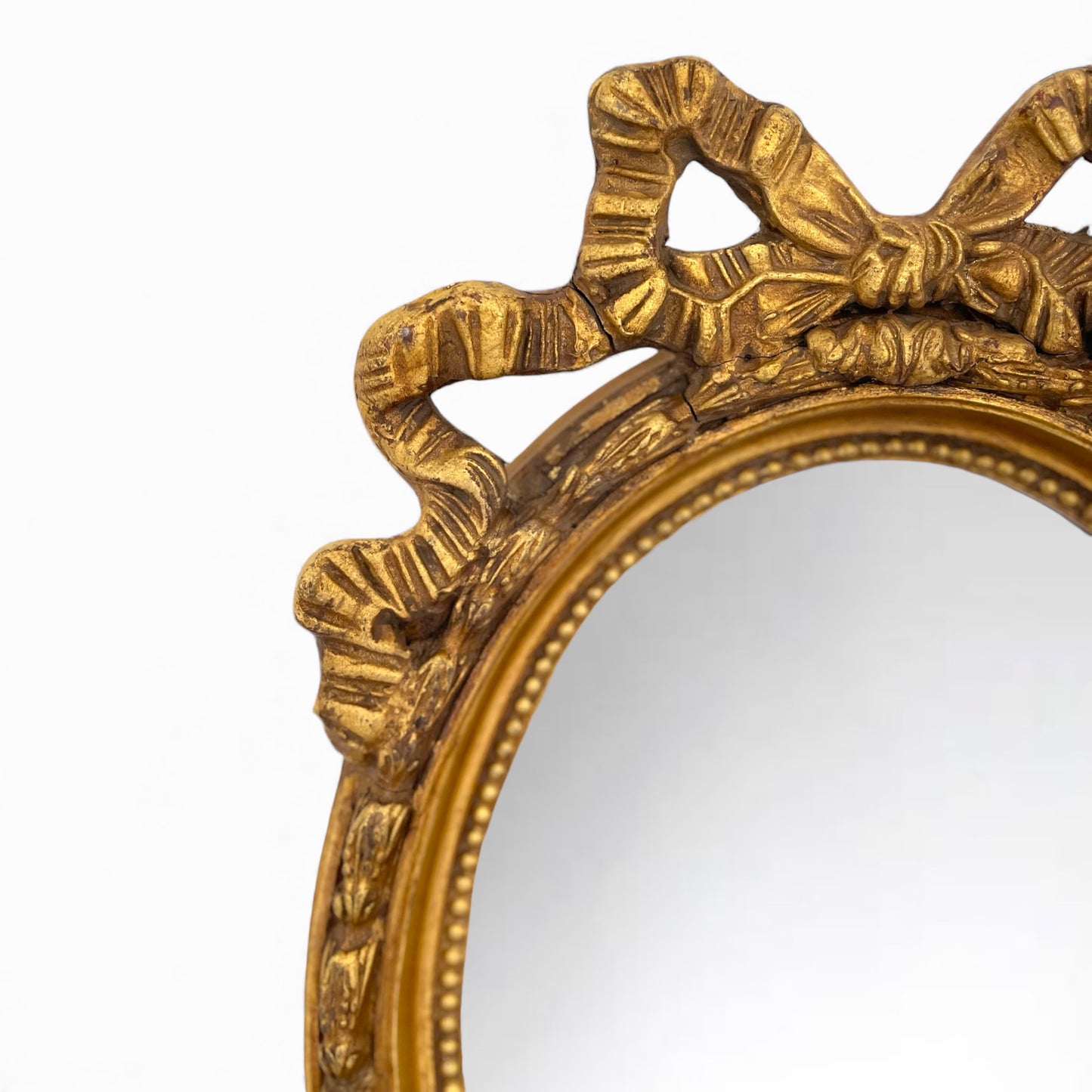 19th CENTURY FRENCH GILTWOOD OVAL MIRROR