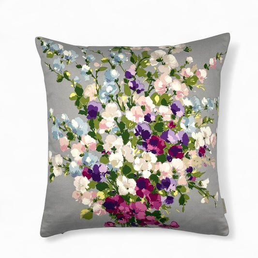 Pillow in Nina Campbell “bouquet on grey” fabric and back in jacquard pattern