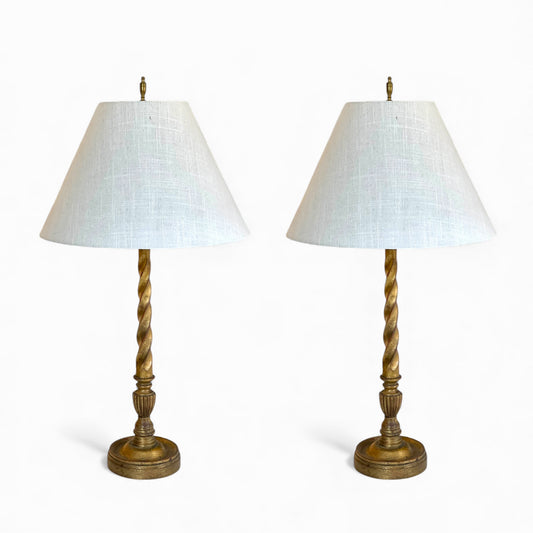 Pair of antique Italian gilded twisted wood lamps