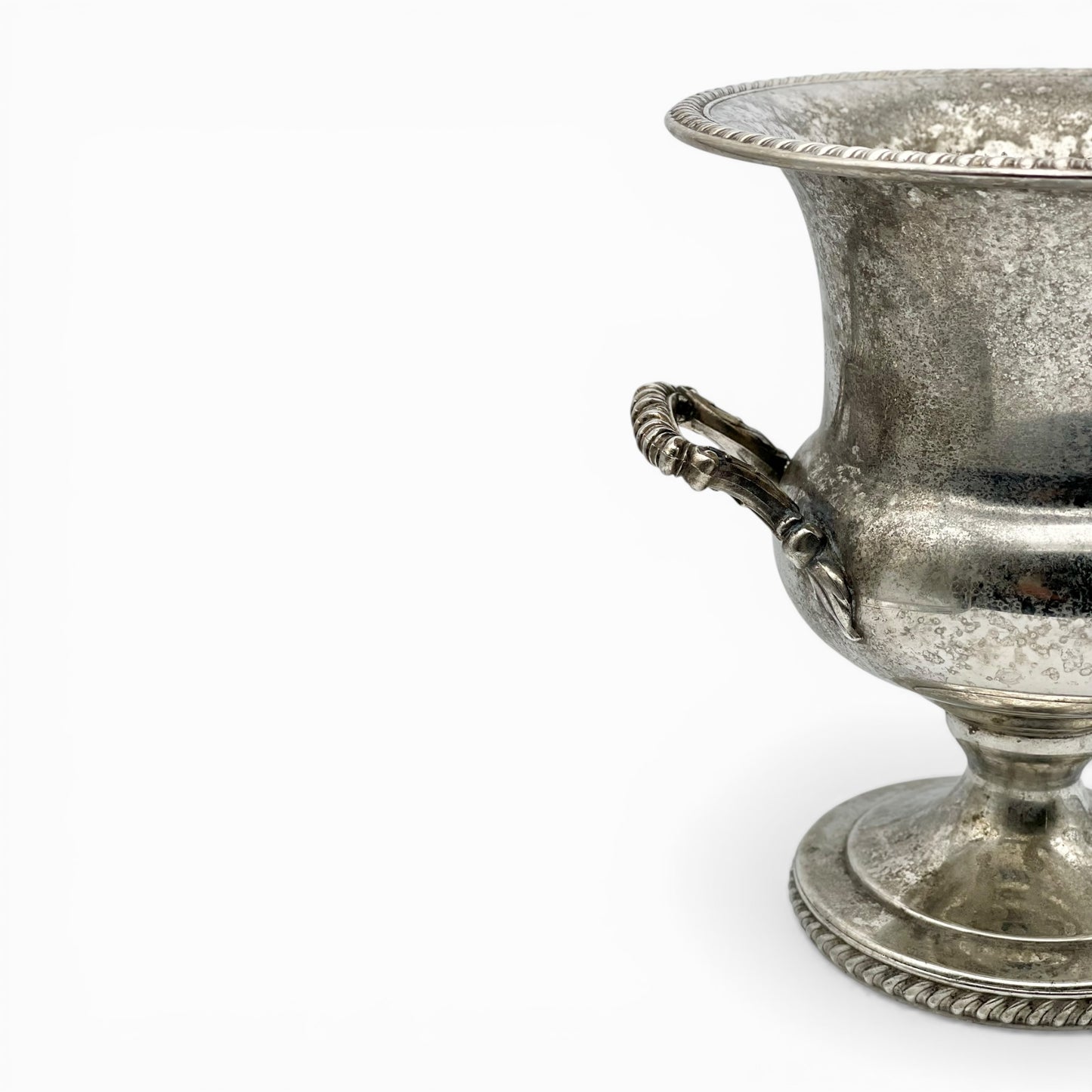 Vintage silver-plated champagne bucket with ornate handles