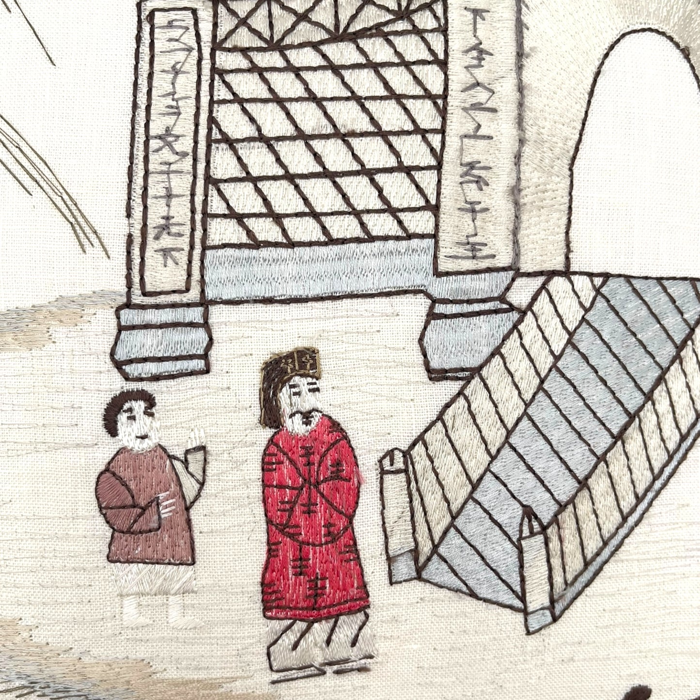 Pillow made with embroidered “Nina Campbell” linen