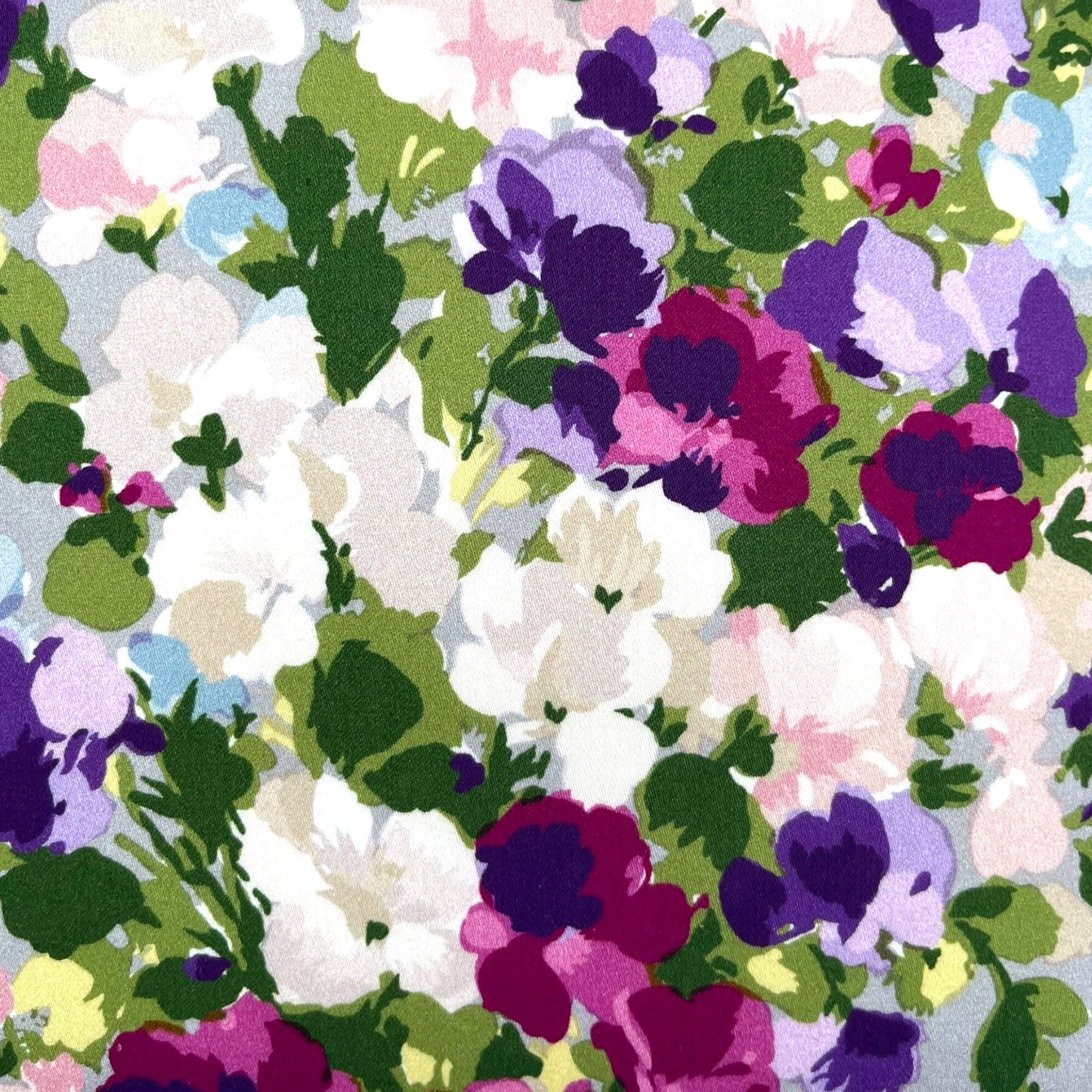 Pillow in Nina Campbell “bouquet on grey” fabric and back in jacquard pattern