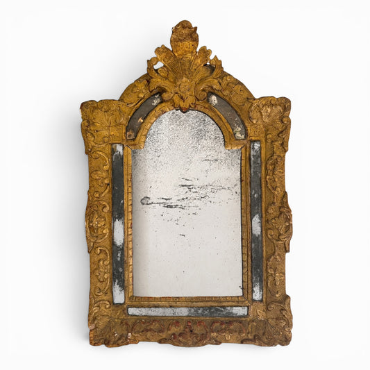 Antique ornate carved giltwood mirror