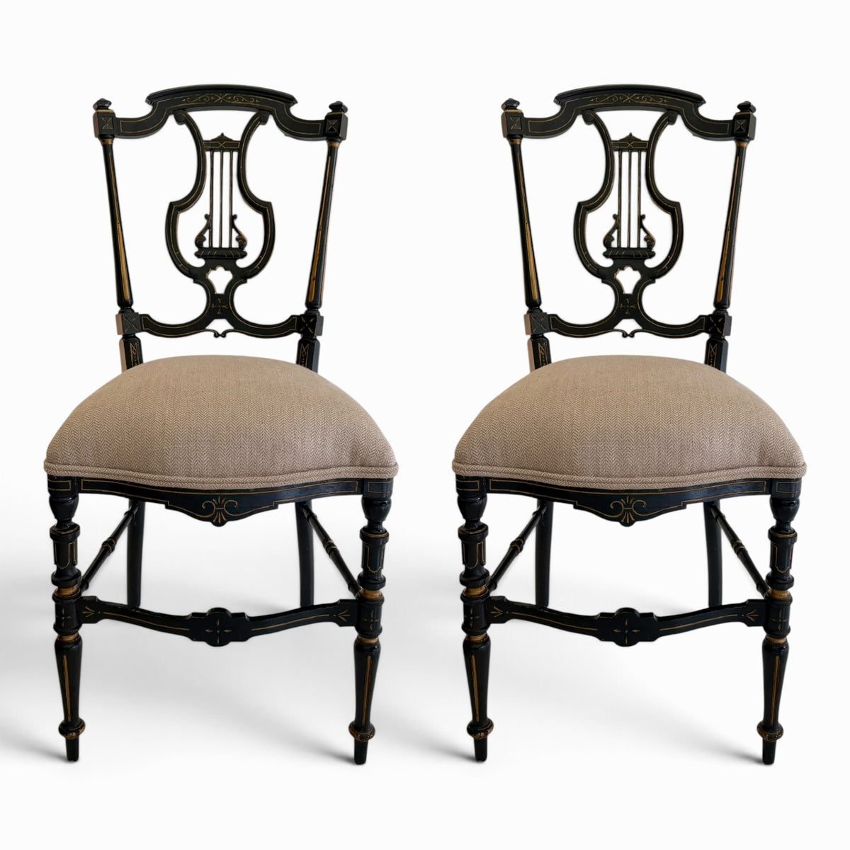 Pair of English Regency Ebonized & Parcel-Gilt Lyre-Back Side Chairs, c. 1820