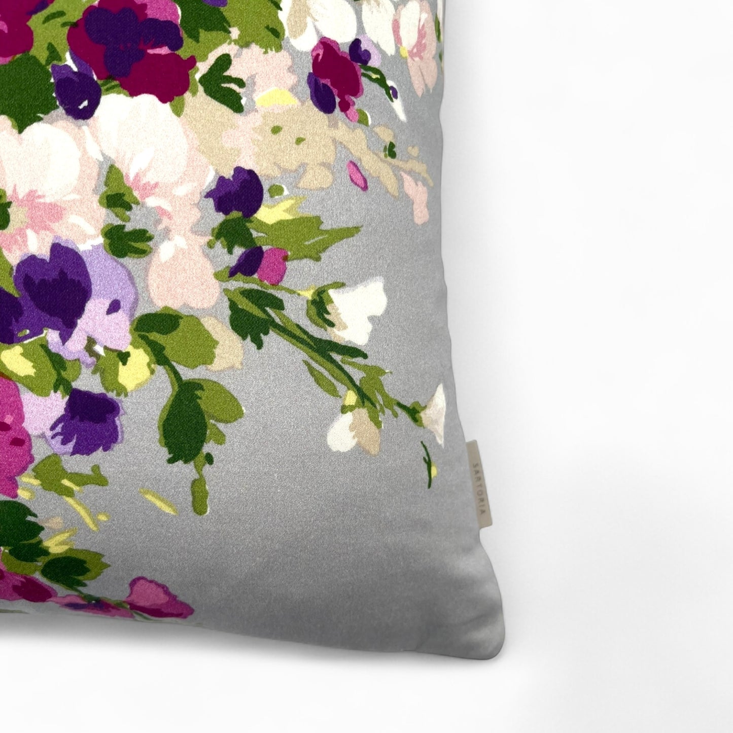 Pillow in Nina Campbell “bouquet on grey” fabric and back in jacquard pattern