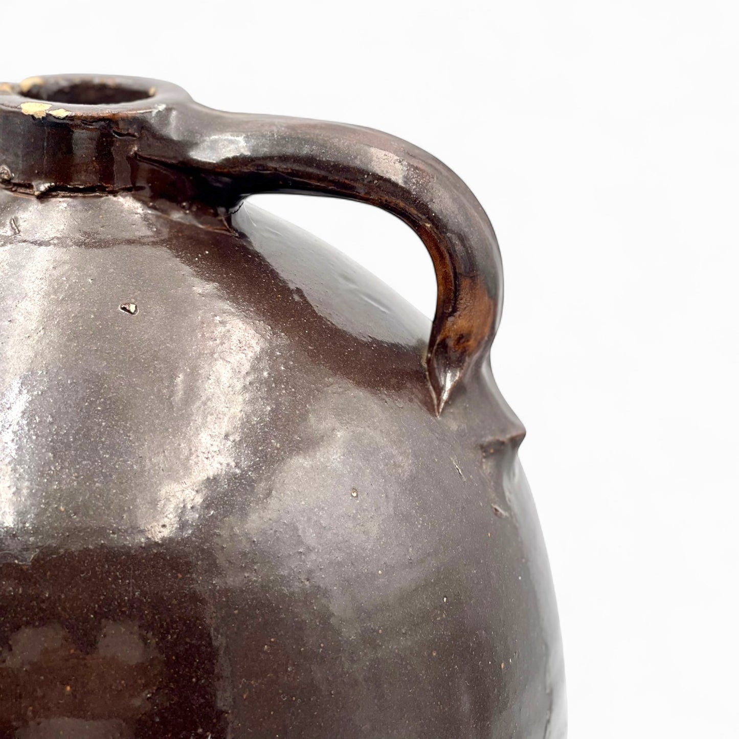 Brown glazed stoneware jug